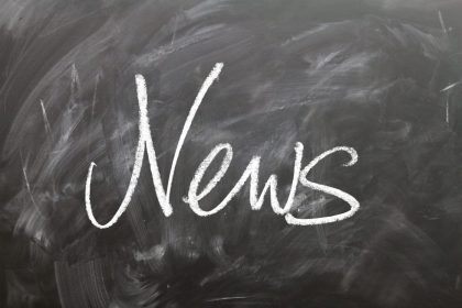 Image of the word news on a chalkboard