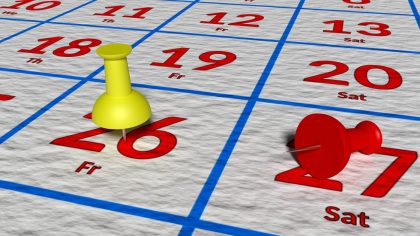 Image of Calendar Dates with Push Pins