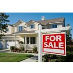 Image of a house with for sale sign