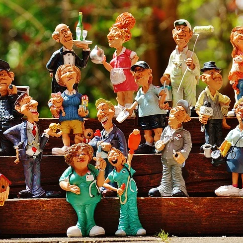 communities image of a group of figurines on steps